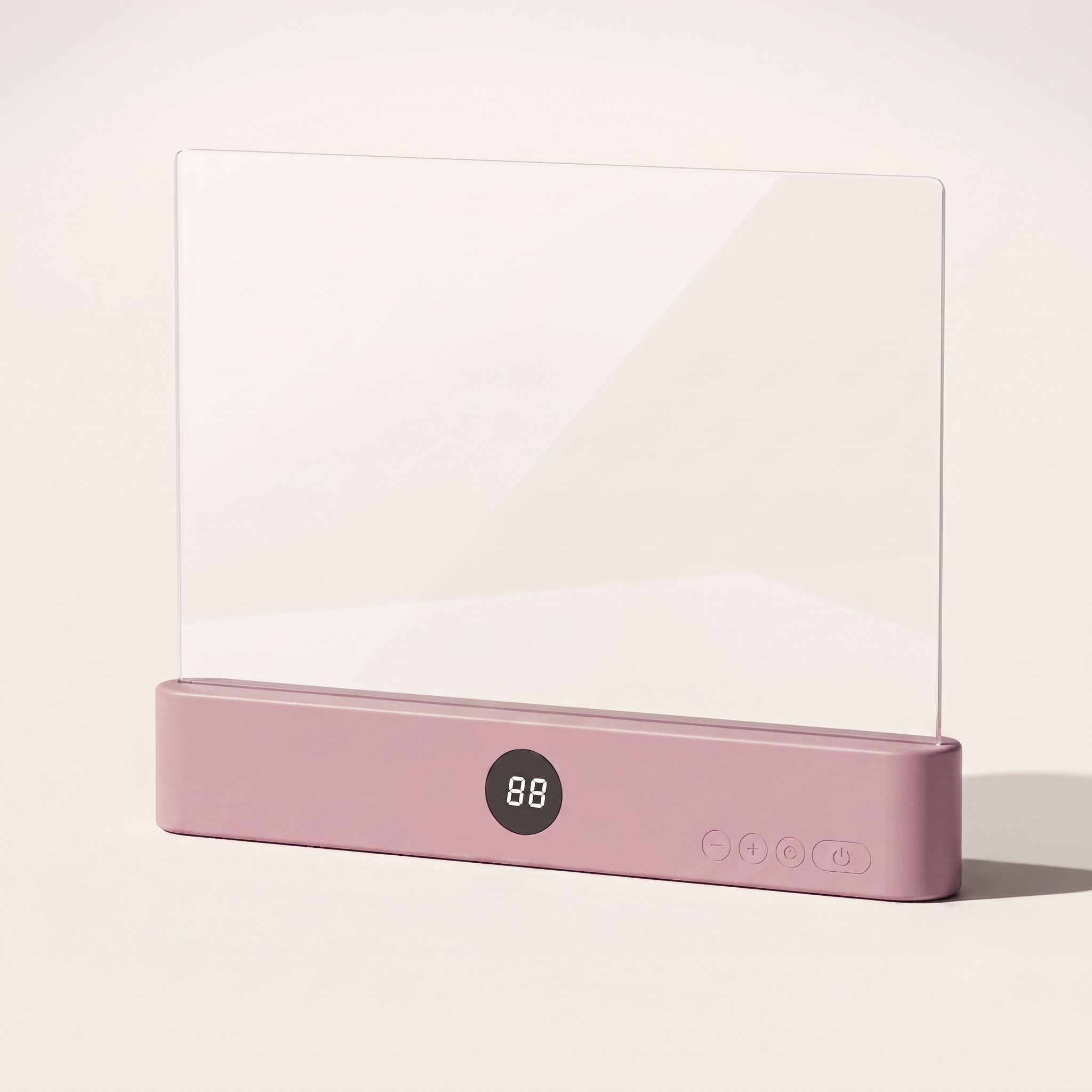 A studio product variant shot of the By1994 flat page reading lamp in soft pink, highlighting the clear transparent lens panel and the matte pink base with a digital LED screen display.
