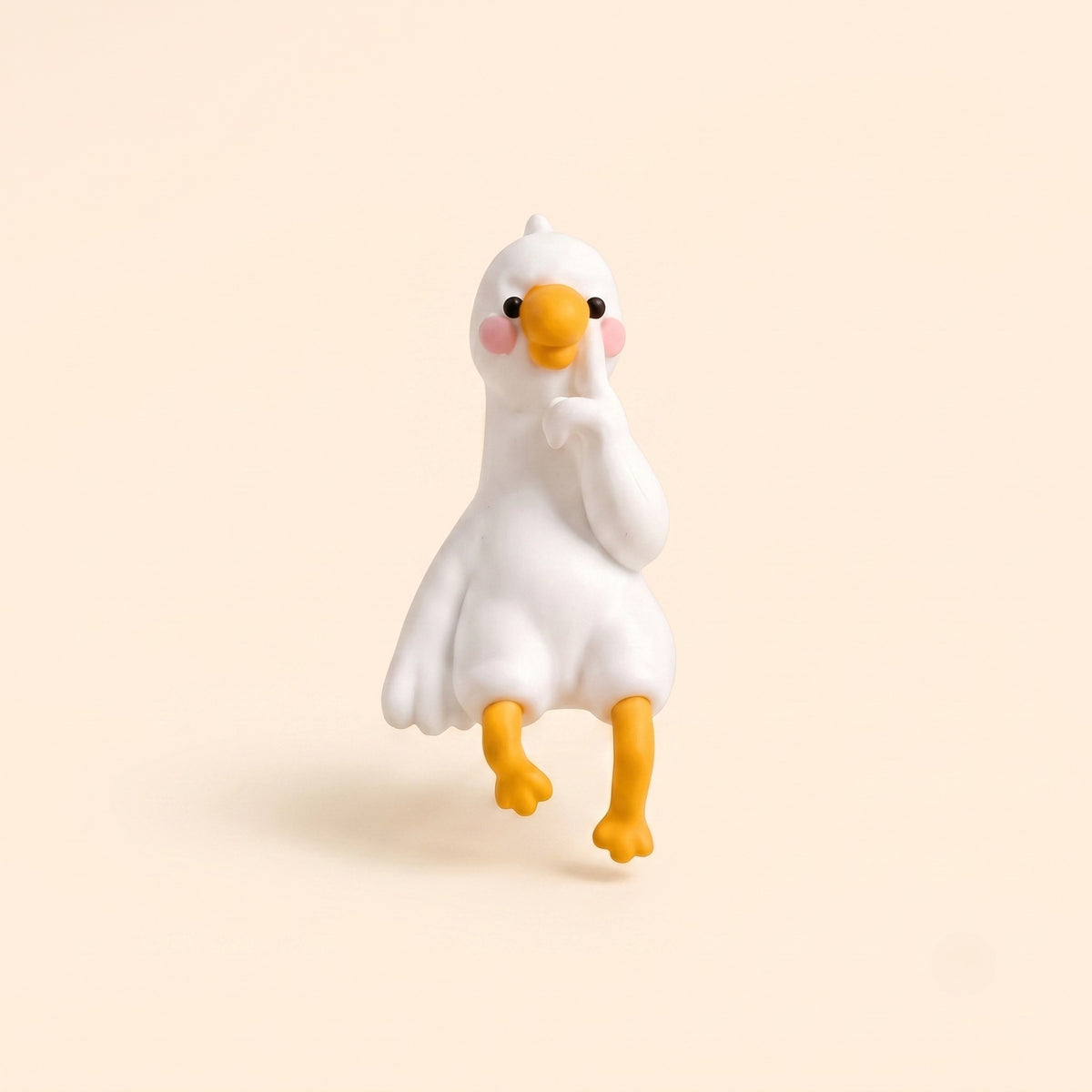 A clean studio hero shot of the By1994 mini duck figurine in the Thinking pose, featuring a white resin duck sitting thoughtfully with its finger on its beak on a light cream background.